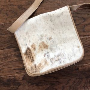 Cowhide cross body bag from Africa